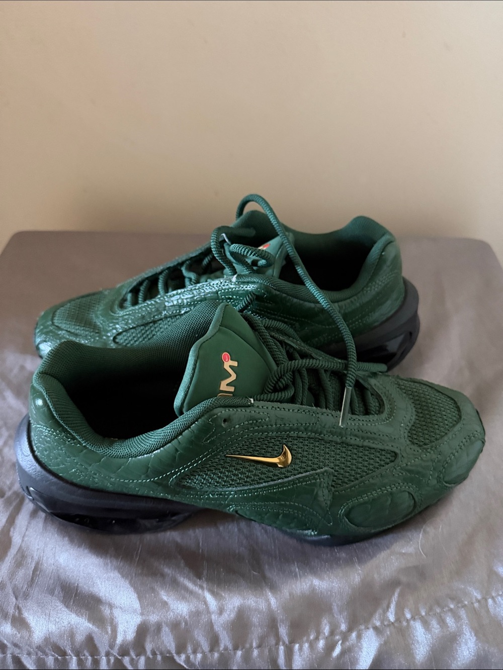 Nike Women's Green Athletic Sneakers with Gold Swoosh